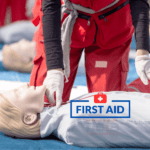 Trainer demonstrating CPR techniques during a first aid course in Tasmania